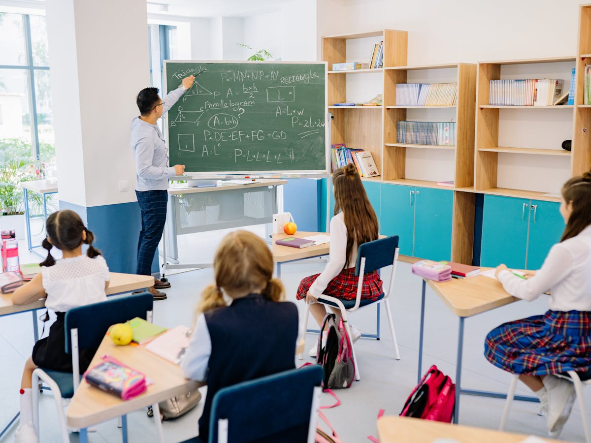 Teacher leading a math lesson for K-12 students