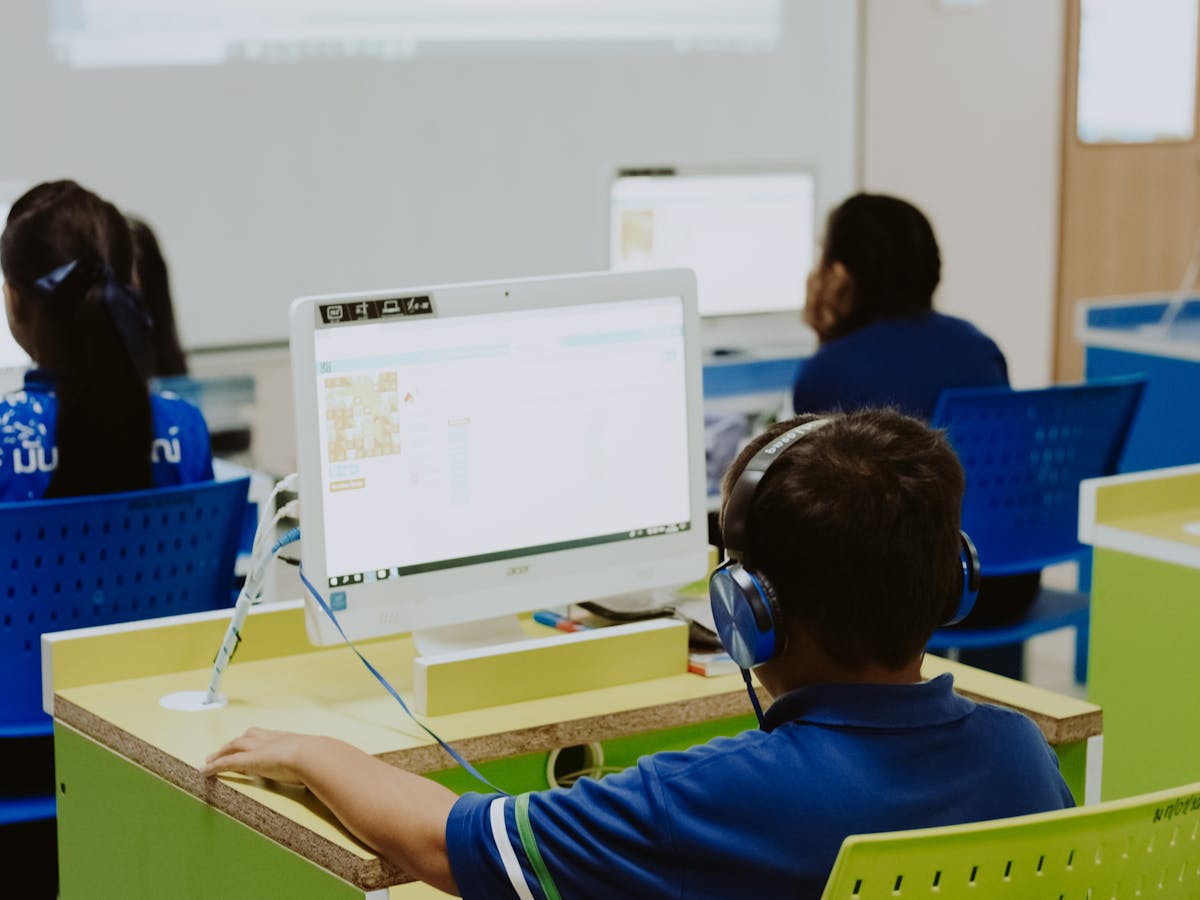 Students using computers in a classroom